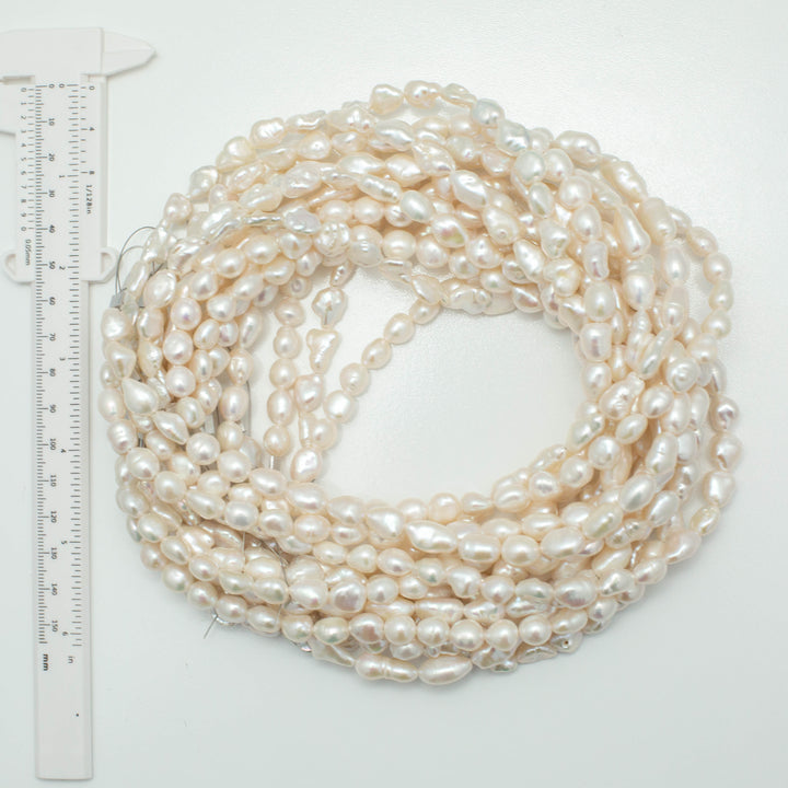 Baroque 8-9mm Keshi Pearls White AAA Pearl Strands